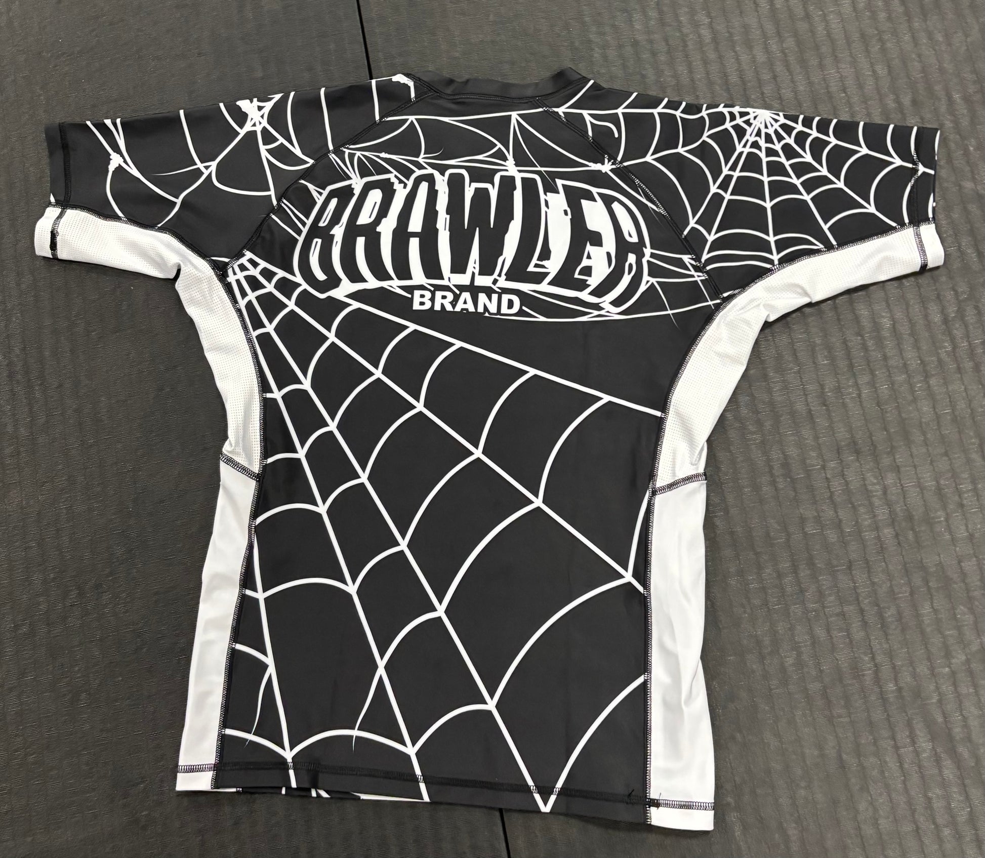 "CAUGHT" Rash Guard