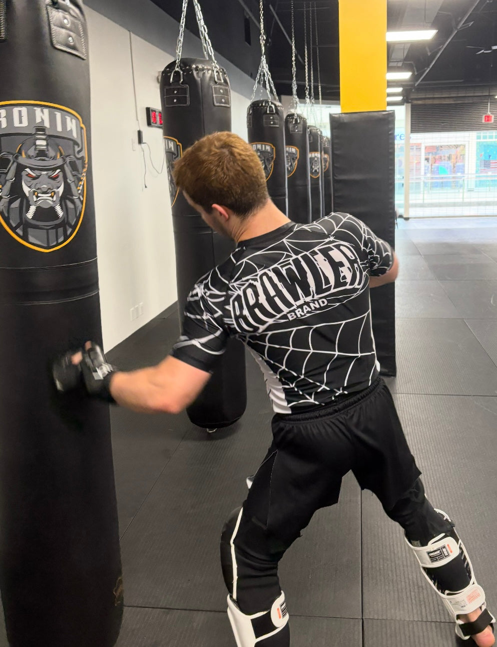 "CAUGHT" Rash Guard